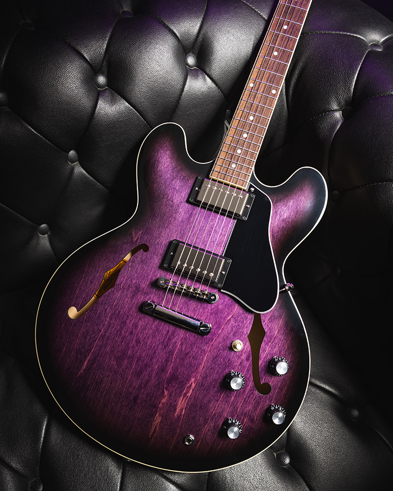 Gibson is at the forefront of innovation and timeless design, and the latest offerings are no exception. An additional three of Gibson’s most iconic models are now available in an exclusive Dark Purple Burst finish. 
These models include the versatile ES-335, the sleek SG Modern, and the refined Les Paul Modern Studio. Each guitar not only boasts a stunning new look but also delivers exceptional performance and quality.
ES-335: The Timeless Tradition of Versatility
The Gibson ES-335 DOT has been a cornerstone of the Gibson ES lineup since its debut in 1958, setting an unmatched standard in the world of guitars. This model features a pearloid dot inlay rosewood fingerboard on a hand-rolled Rounded "C" mahogany neck, reminding players of its rich heritage. 
The calibrated T-Type humbucking pickups paired with a hand-wired control assembly deliver the versatile Gibson ES tone that has been coveted for over six decades. The Vintage Deluxe tuners with Keystone buttons ensure tuning stability and precise intonation. They are combined with a lightweight Aluminum ABR-1 bridge and Stop Bar tailpiece anchored by steel thumbwheels and tailpiece studs. 
Now available in an exclusive Dark Purple Burst finish, the ES-335 continues to captivate players with its timeless appeal.
SG Modern: A New SG For Modern Times
The refreshed Gibson SG Modern merges contemporary updates with the classic SG design, creating a hybrid between an SG and a Les Paul. This model features an AA maple top and mahogany back, renowned for their resonance and sustain. The genuine ebony, 24-fret compound radius fingerboard, and asymmetrical SlimTaper neck provide fast and silky access to the highest frets. 
Calibrated Burstbucker Pro Alnico 5 humbuckers deliver powerful tones, while push-pull controls offer versatility, allowing players to switch between humbucker and single coil P-90 sounds. Upscale appointments include genuine mother-of-pearl inlays, Grover Rotomatic tuners, and clear Top Hat knobs.
 The SG Modern in Dark Purple Burst is a stunning addition to any guitarist's collection.
Les Paul Modern Studio: The Legendary Les Paul Studio, Updated With Modern Refinements
The Les Paul Studio has long been favored by guitarists for its combination of an Ultra Modern weight-relieved mahogany body and maple cap paired with simplified cosmetic appointments. The new Les Paul Modern Studio incorporates many enhancements from the Les Paul Modern, including a bound ebony fretboard with a compound radius for improved action and playability, a Modern Contoured Heel for exceptional upper-fret access, and black nickel hardware. 
Additional features include coil tapping, phase control, and pure bypass switching for ultimate tonal flexibility. 
The Les Paul Modern Studio in Dark Purple Burst comes with a soft shell case, making it a high-performance tone machine ready for any stage.
Check Out the New Additions
The exclusive Dark Purple Burst Collection brings a fresh, vibrant look to three popular models. Whether you’re a fan of the versatile ES-335, the sleek SG Modern, or the refined Les Paul Modern Studio, these guitars offer a unique blend of style and performance. Don’t miss your chance to own one of these stunning instruments, available only from Gibson.com in this exclusive finish. 
Elevate your playing experience with Gibson’s latest and explore the Dark Purple Burst Collection.

