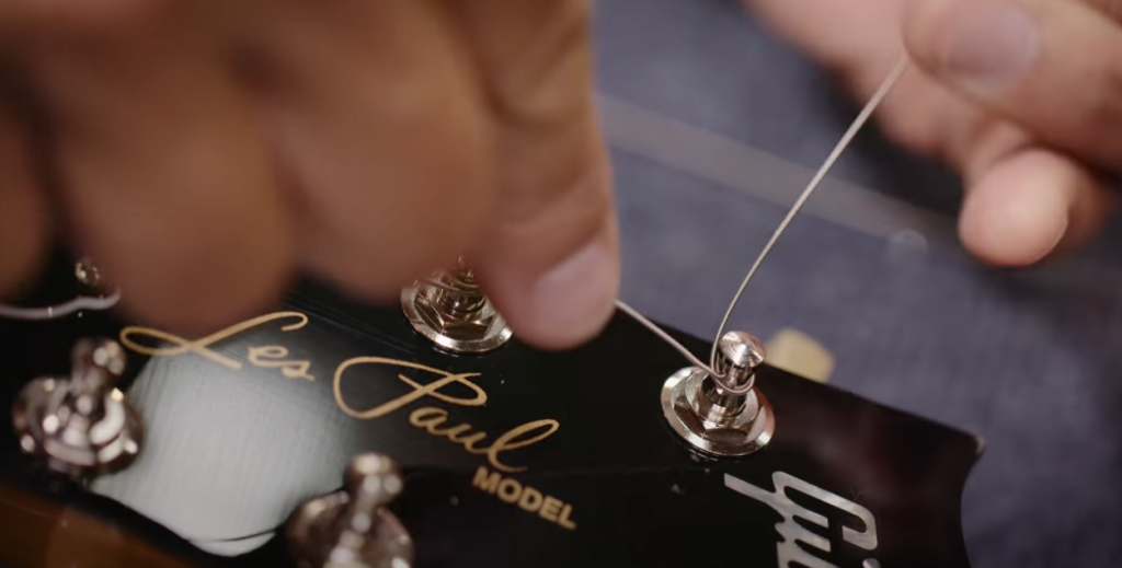 Master Luthier Jim DeCola shows how to lock the Z bend while changing electric guitar strings