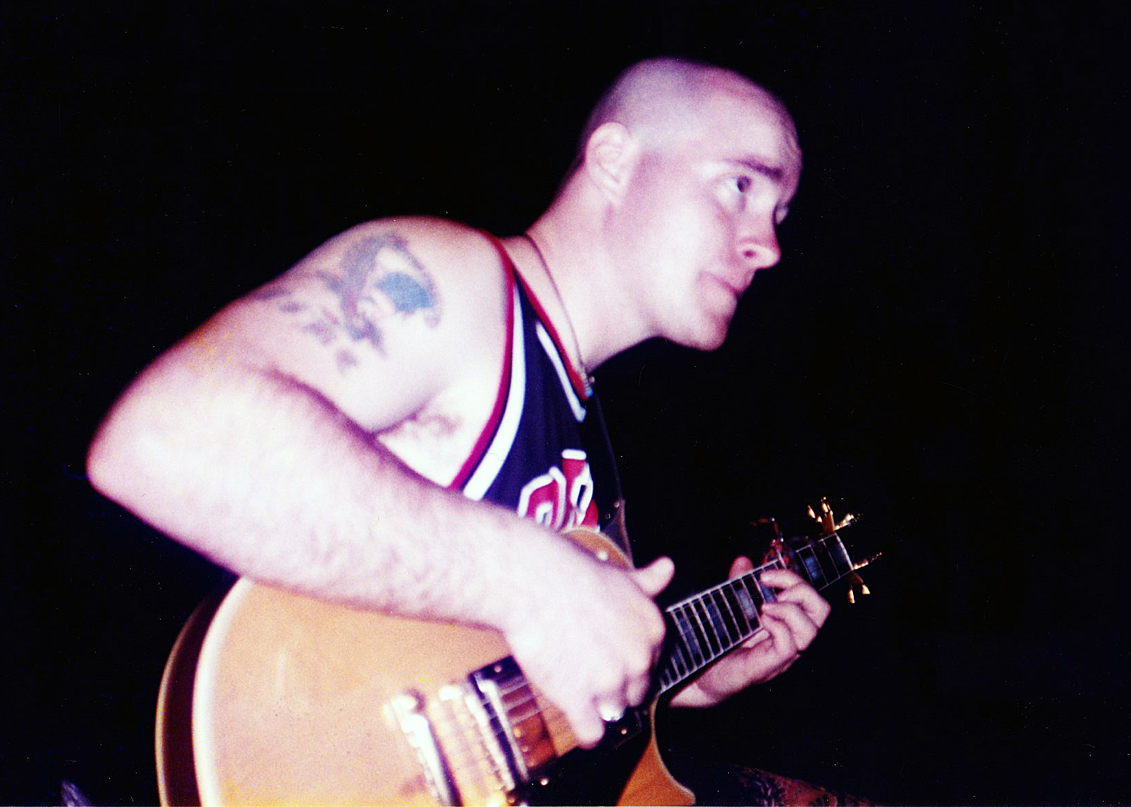Jason Thalman and his Les Paul Custom guitar prior to its theft